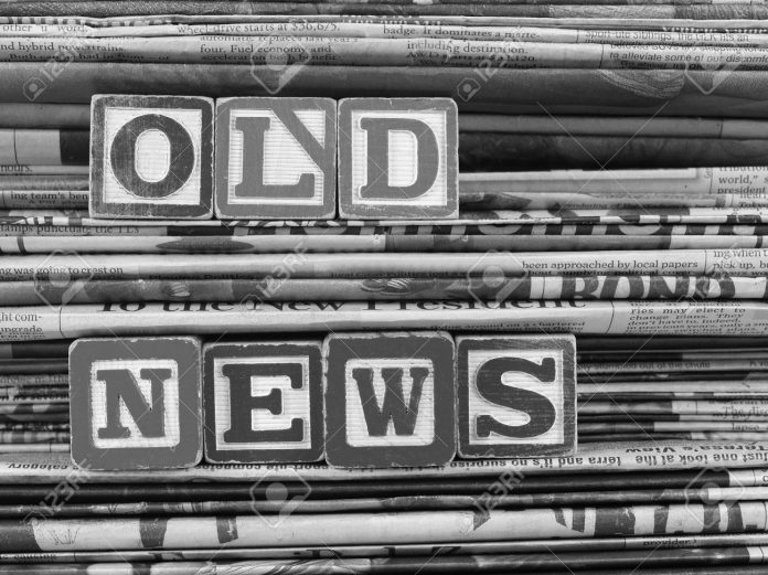 4846189-Old-newspapers-stacked-filling-the-frame-and-Old-News-in-block-letters-Stock-Photo